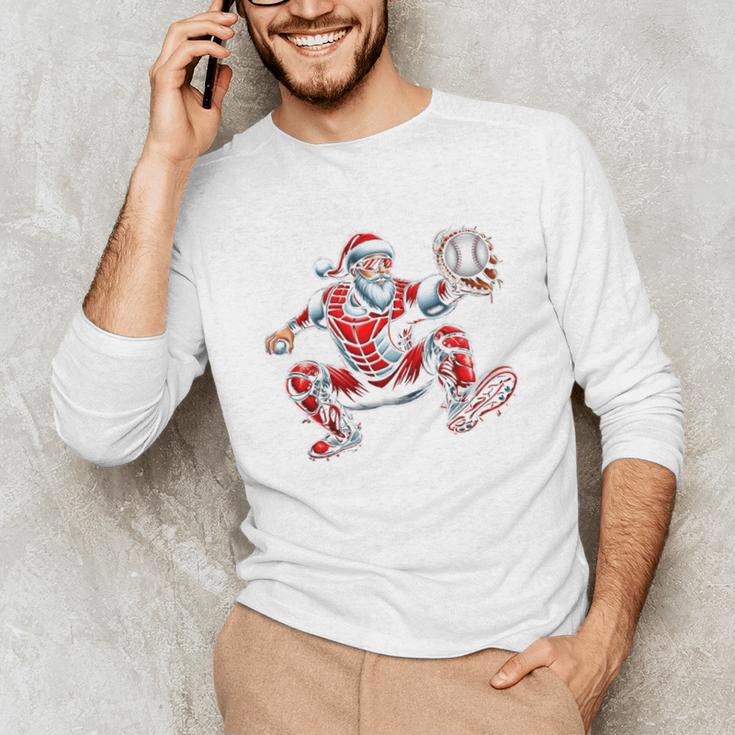 Santa Playing Baseball Catcher Merry Christmas Sport Player Unisex Long Sleeve T-Shirt Santa Playing Baseball Catcher Merry Christmas Sport Player Unisex Long Sleeve T-Shirt