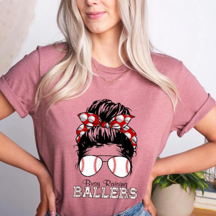 Busy Raising Ballers Messy Bun Funny Baseball Mom Women's Heather T-Shirt