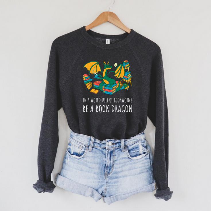 Book Lover In A World Full Of Bookworms Be A Book Dragon Raglan Sleeve Sweatshirt