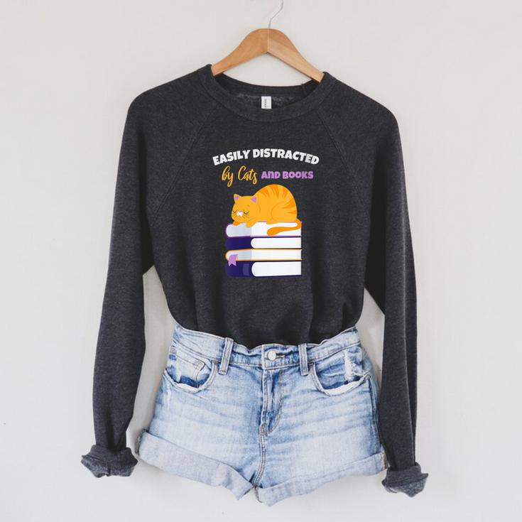Easily Distracted Cats And Books Cute Cat Book Lover Raglan Sleeve Sweatshirt