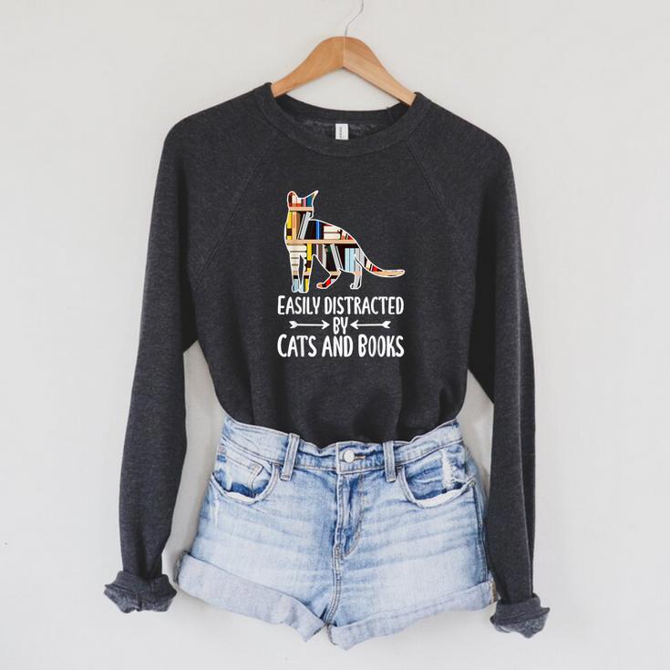 Easily Distracted By Cats And Books Reader Cat Lovers For Men Women Girls Kids Raglan Sleeve Sweatshirt