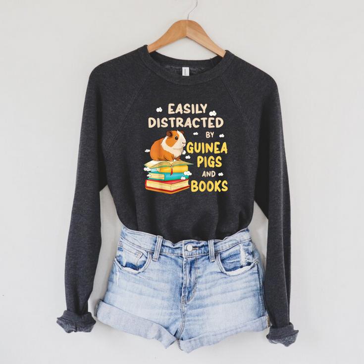 Easily Distracted By GUINEA PIGS And Books Raglan Sleeve Sweatshirt