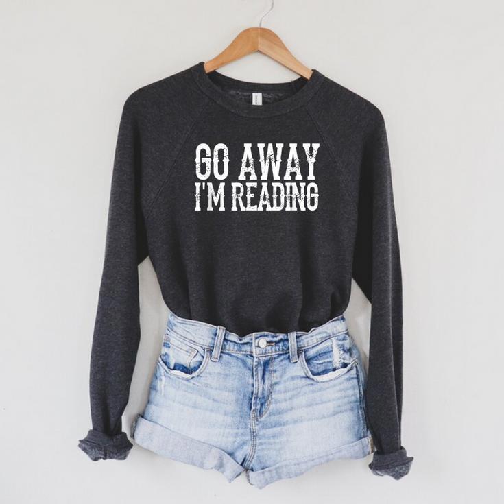 Go Away I'm Reading Book Reader Bookworm Bibliophile Raglan Sleeve Sweatshirt