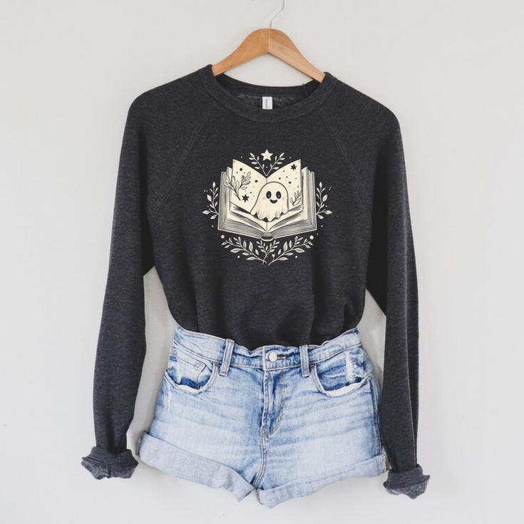 Haunted Library – Glowing Book Raglan Sleeve Sweatshirt