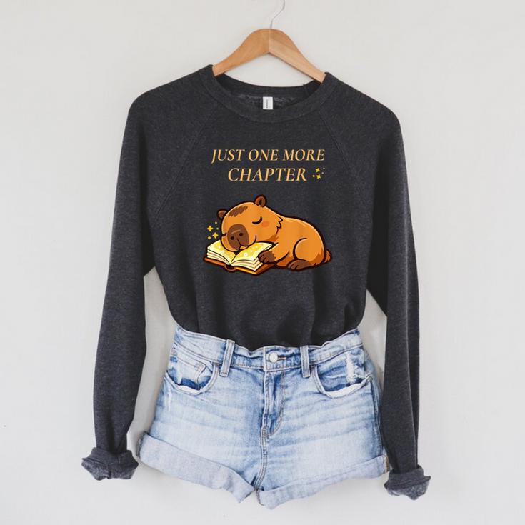 Just One More Chapter Capybara With Book Raglan Sleeve Sweatshirt