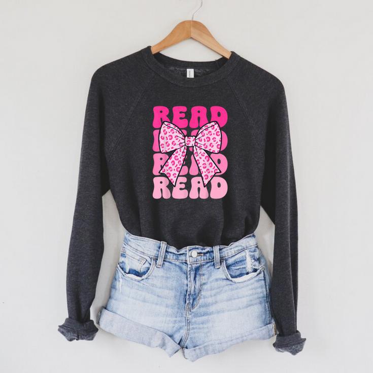 Pink Leopard Read Coquette Bow Girls Retro Groovy Reading Raglan Sleeve Sweatshirt