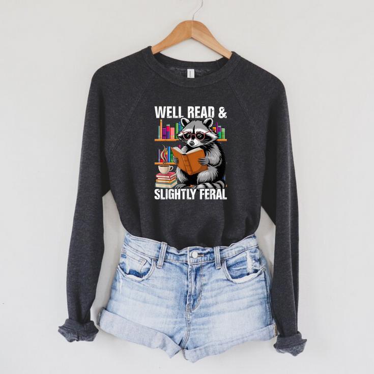 Well Read & Slightly Feral Raccoon Book Lover Graphic Raglan Sleeve Sweatshirt