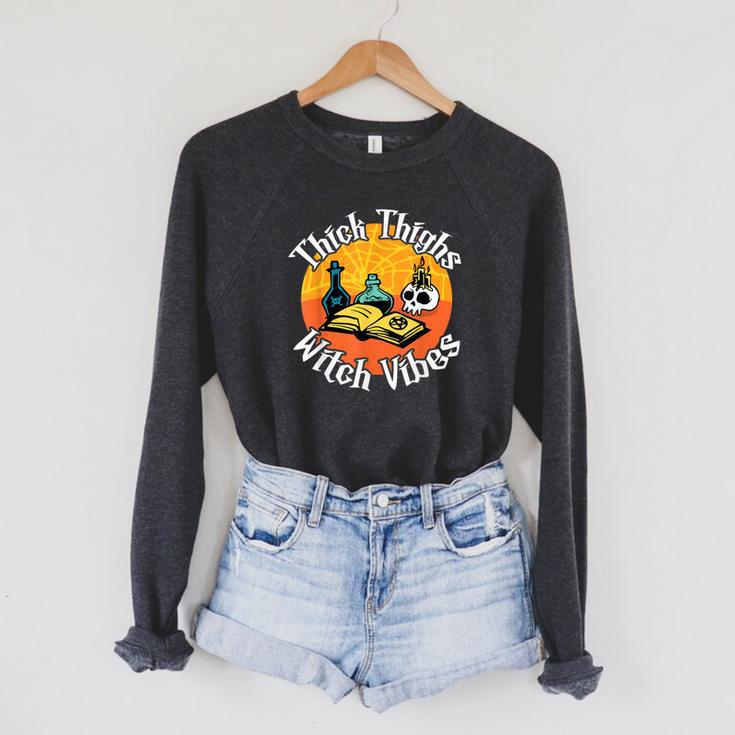Thick Thighs Witch Vibes Spell Book And Potions Raglan Sleeve Sweatshirt