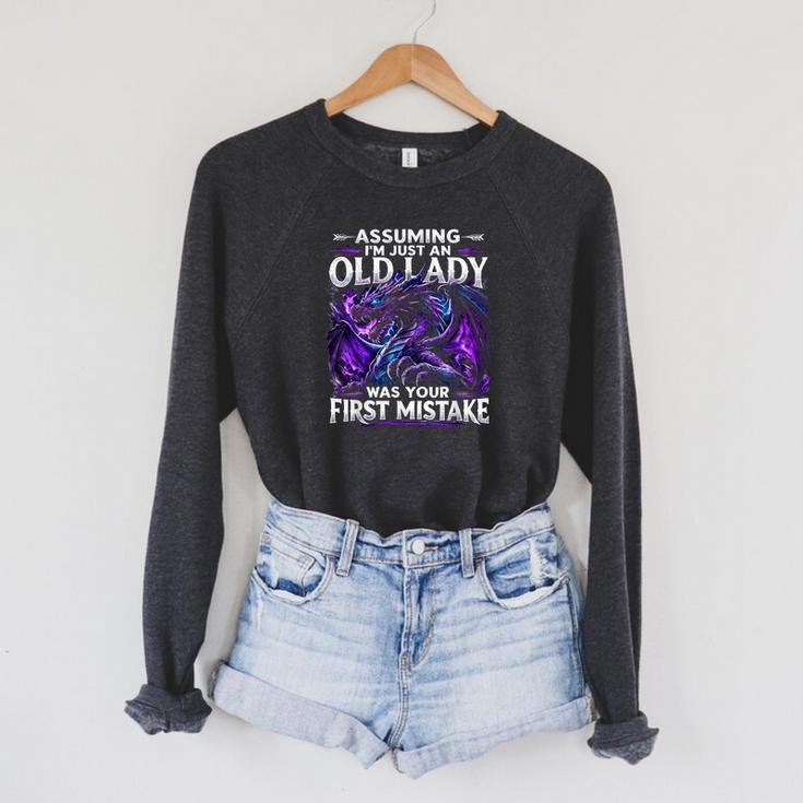 Assuming I'm Just An Old Lady Fantasy Book Reader Mom Dragon Raglan Sleeve Sweatshirt
