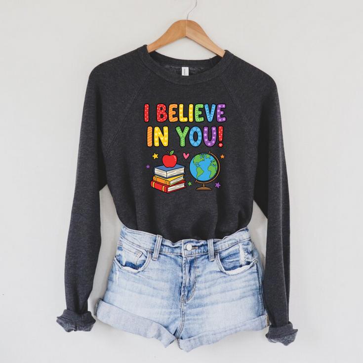 I Believe In You Educational Art With Books And Globe Raglan Sleeve Sweatshirt