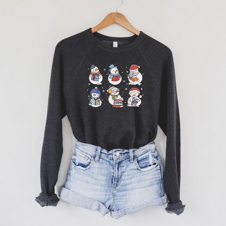Book Lover Teacher Snowman Reading Books Christmas Winter Raglan Sleeve Sweatshirt Book Lover Teacher Snowman Reading Books Christmas Winter Raglan Sleeve Sweatshirt