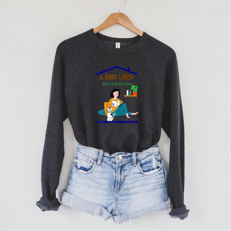 A Book Lover With A Willful Cat Women Kids Raglan Sleeve Sweatshirt