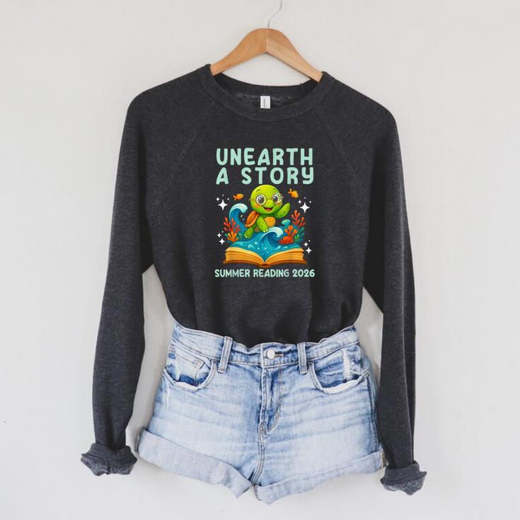 Book Sea Turtle Summer Reading 2026 Unearth a Story Raglan Sleeve Sweatshirt