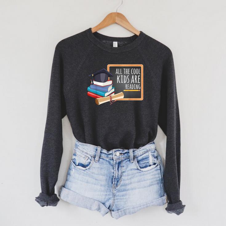 All The Cool Kids Are Reading Book Nerd School Graduation Raglan Sleeve Sweatshirt