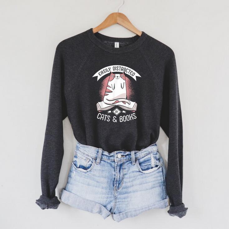 Easily Distracted By Cats And Books Men Cat Book Lover Raglan Sleeve Sweatshirt Easily Distracted By Cats And Books Men Cat Book Lover Raglan Sleeve Sweatshirt