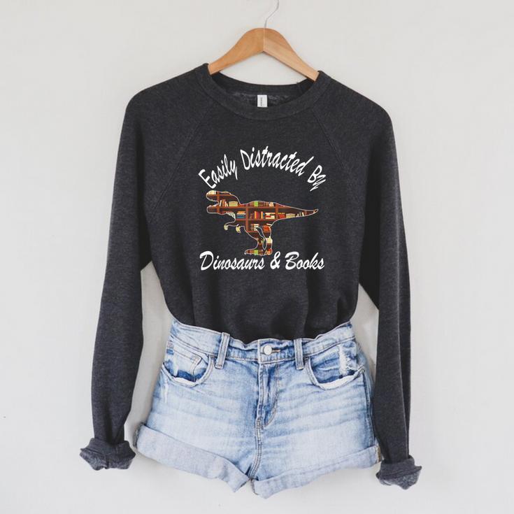 Easily Distracted By Dinosaurs And Books Outfits Men Women Raglan Sleeve Sweatshirt Easily Distracted By Dinosaurs And Books Outfits Men Women Raglan Sleeve Sweatshirt