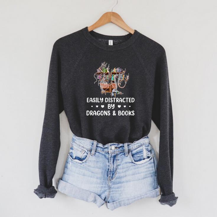 Easily Distracted By Dragons & Books Dragon Book Reading Raglan Sleeve Sweatshirt