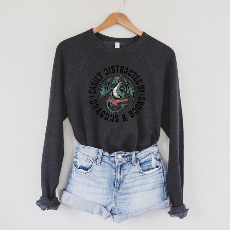 Easily Distracted By Dragons & Books Raglan Sleeve Sweatshirt Easily Distracted By Dragons & Books Raglan Sleeve Sweatshirt
