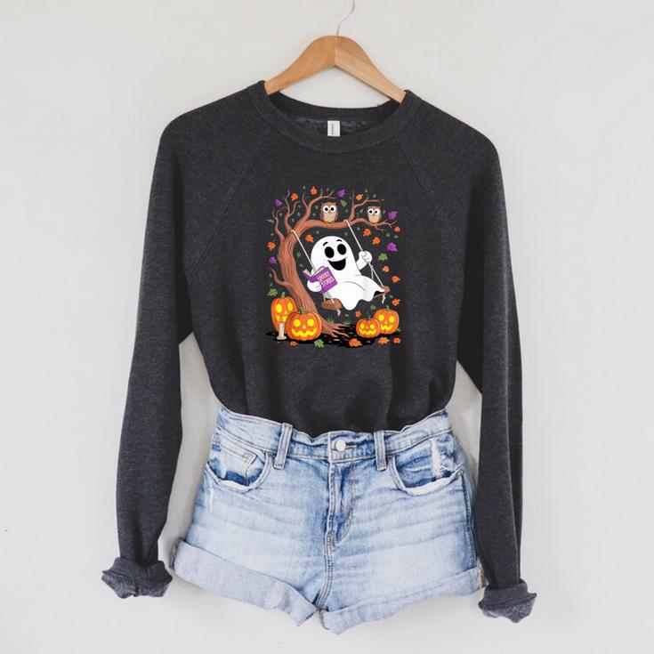 Ghost Reading Book On Swing Halloween Autumn Art Raglan Sleeve Sweatshirt