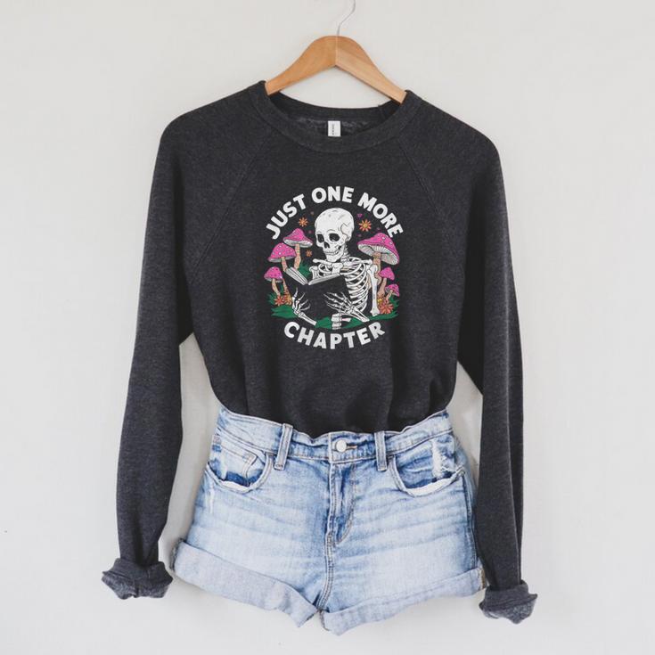 Just One More Chapter Mushrooms Gothic Skeleton Book Lover Premium Raglan Sleeve Sweatshirt Just One More Chapter Mushrooms Gothic Skeleton Book Lover Premium Raglan Sleeve Sweatshirt