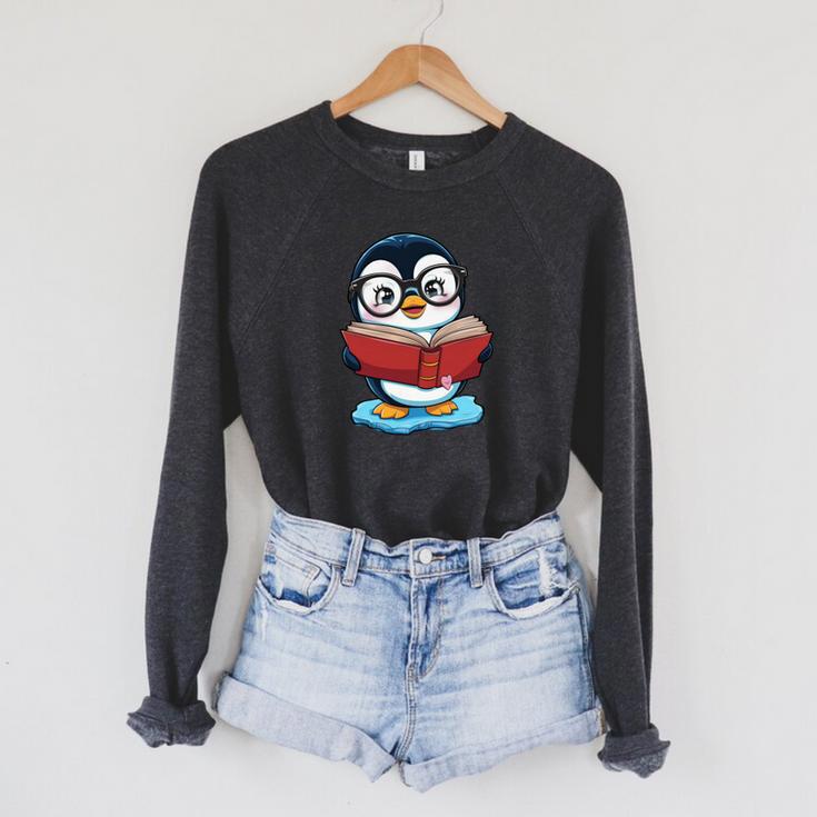 Kawaii Penguin In Cartoon Style With Book And Glasses Raglan Sleeve Sweatshirt
