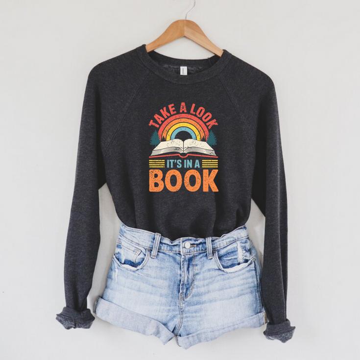 Take A Look It's In A Book Retro Reading Book Lover Premium Tri-Blend Raglan Sleeve Sweatshirt Take A Look It's In A Book Retro Reading Book Lover Premium Tri-Blend Raglan Sleeve Sweatshirt