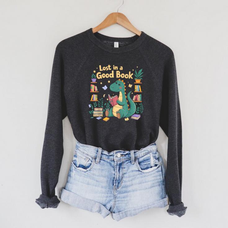 Lost In a Good Book Cute Reading Dinosaur Illustration Raglan Sleeve Sweatshirt