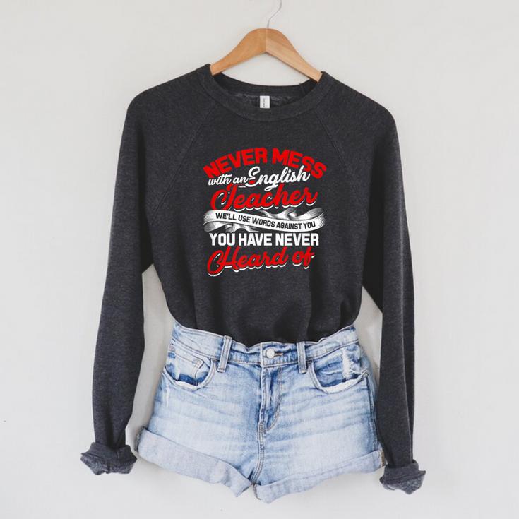 Never Mess With An English Teacher We'Ll Use Words Books Men Women Raglan Sleeve Sweatshirt