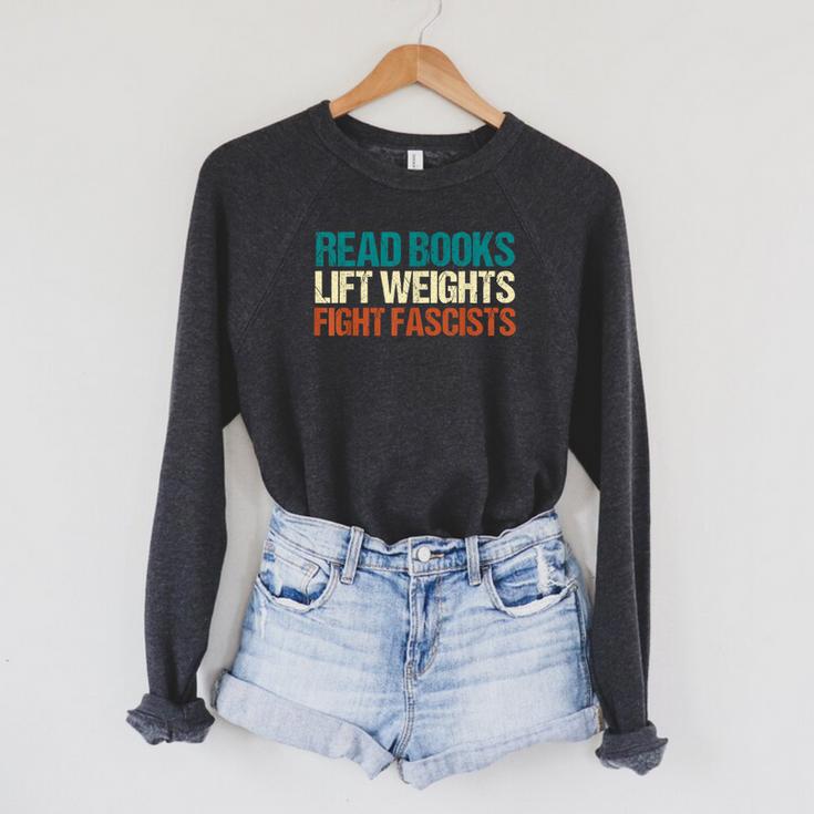 Read Books Lift Weights Fight Fascists Reading Men Women Raglan Sleeve Sweatshirt Read Books Lift Weights Fight Fascists Reading Men Women Raglan Sleeve Sweatshirt