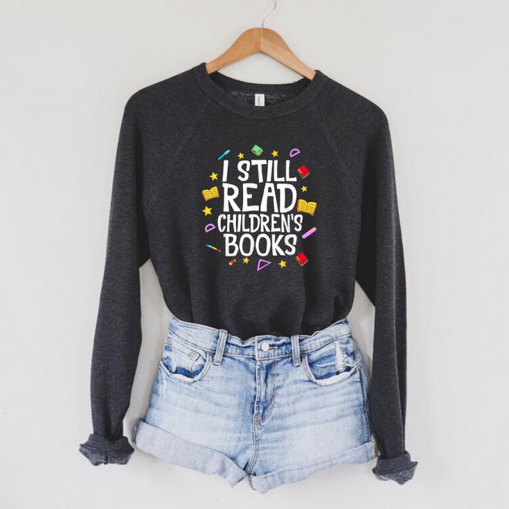 I Still Read Children's Books Reading Books Librarian Raglan Sleeve Sweatshirt I Still Read Children's Books Reading Books Librarian Raglan Sleeve Sweatshirt