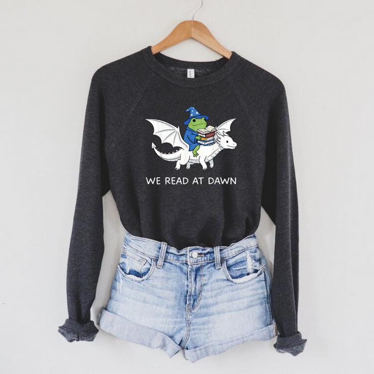 We Read At Dawn Bookish Frog Wizard Reading Raglan Sleeve Sweatshirt
