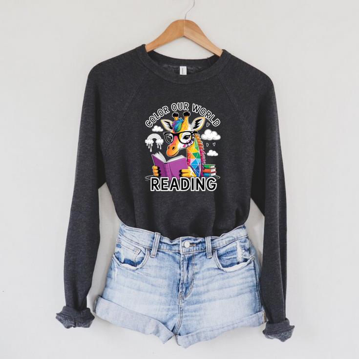 Reading Colors Our World Color Our World 2026 Reading Book Premium Tri-Blend Raglan Sleeve Sweatshirt Reading Colors Our World Color Our World 2026 Reading Book Premium Tri-Blend Raglan Sleeve Sweatshirt