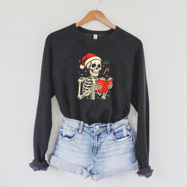 Skeleton Reading Book Christmas Teacher Librarian Book Lover Raglan Sleeve Sweatshirt