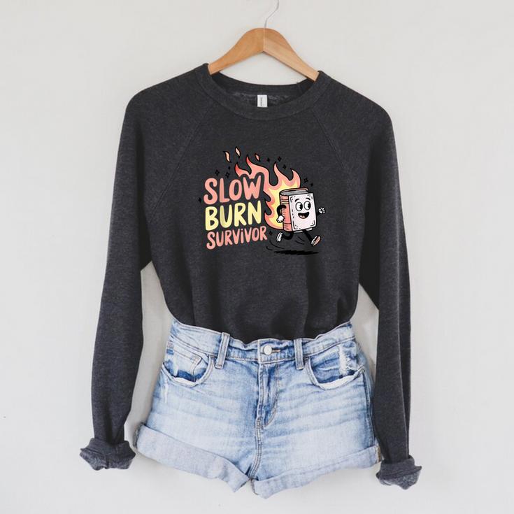 Slow Burns Survivor Book Lover Raglan Sleeve Sweatshirt