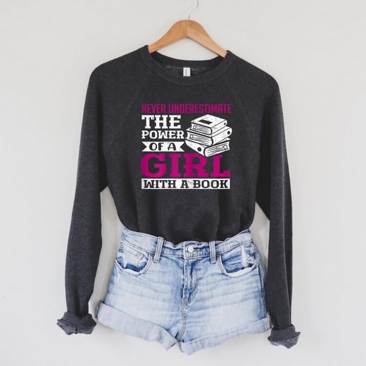 SOMMAS BOOKS Never Underestimate The Power Of a Girl With a Book Reading Raglan Sleeve Sweatshirt