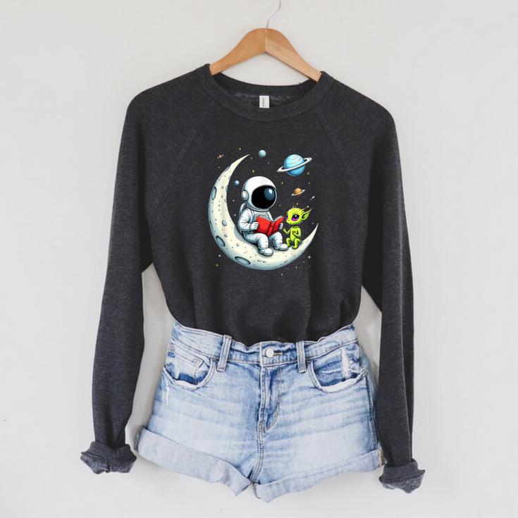 UFO Alien Astronaut Reading Book In Space Raglan Sleeve Sweatshirt UFO Alien Astronaut Reading Book In Space Raglan Sleeve Sweatshirt