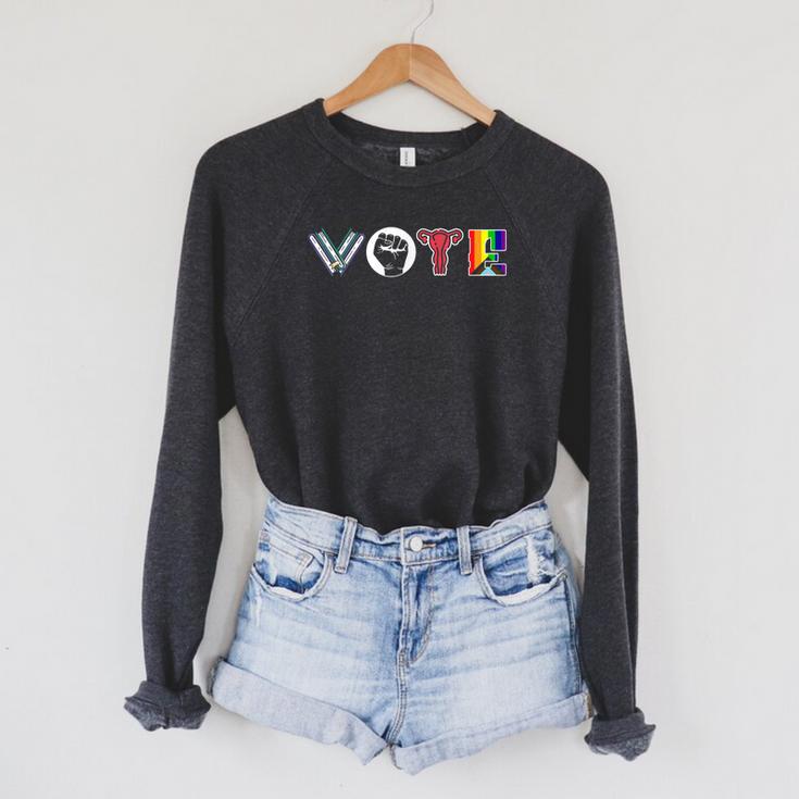 Vote Books Fist Ovaries LGTBQ Men Women Raglan Sleeve Sweatshirt