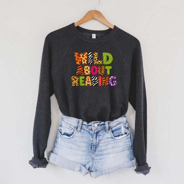 Wild About Reading Book Animal Teacher Children's Book Lover Raglan Sleeve Sweatshirt Wild About Reading Book Animal Teacher Children's Book Lover Raglan Sleeve Sweatshirt
