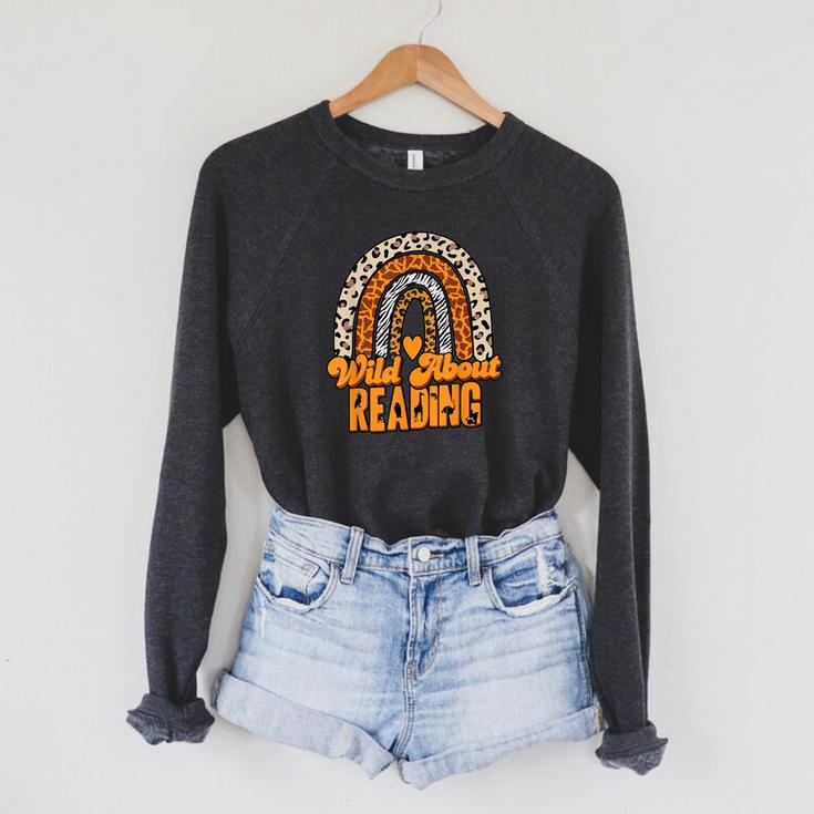 Wild About Reading Books Teacher Leopard Rainbow Men Women Kids Raglan Sleeve Sweatshirt Wild About Reading Books Teacher Leopard Rainbow Men Women Kids Raglan Sleeve Sweatshirt