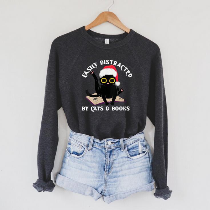 Witchy Book Lover Christmas Cat Reading Mystic Bookworm Raglan Sleeve Sweatshirt