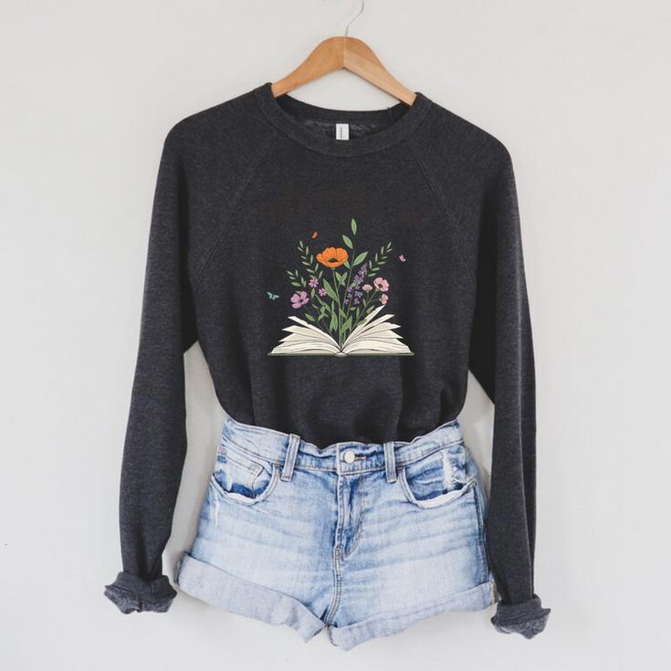 Chapter 18 Book Lovers & Readers 18th Birthday Wildflowers Premium Tri-Blend Raglan Sleeve Sweatshirt