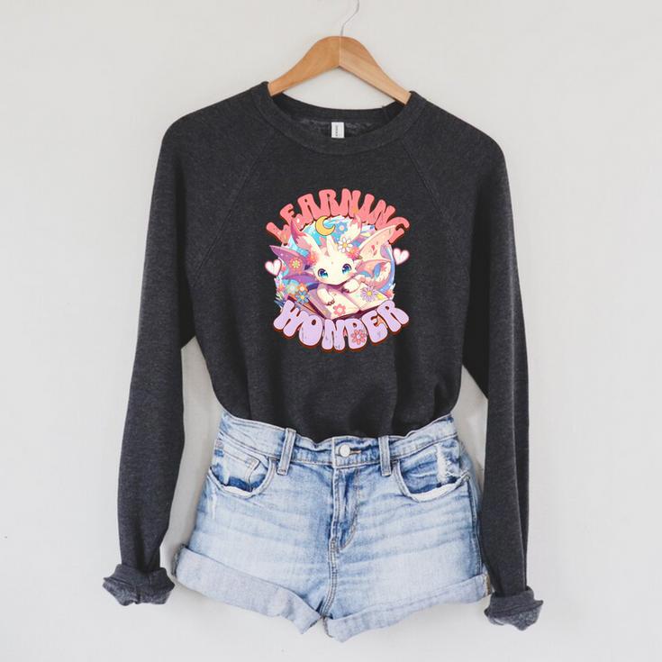 Cute Dragon Learning Wonder Bookworm Girls Books & Dragons Premium Tri-Blend Raglan Sleeve Sweatshirt