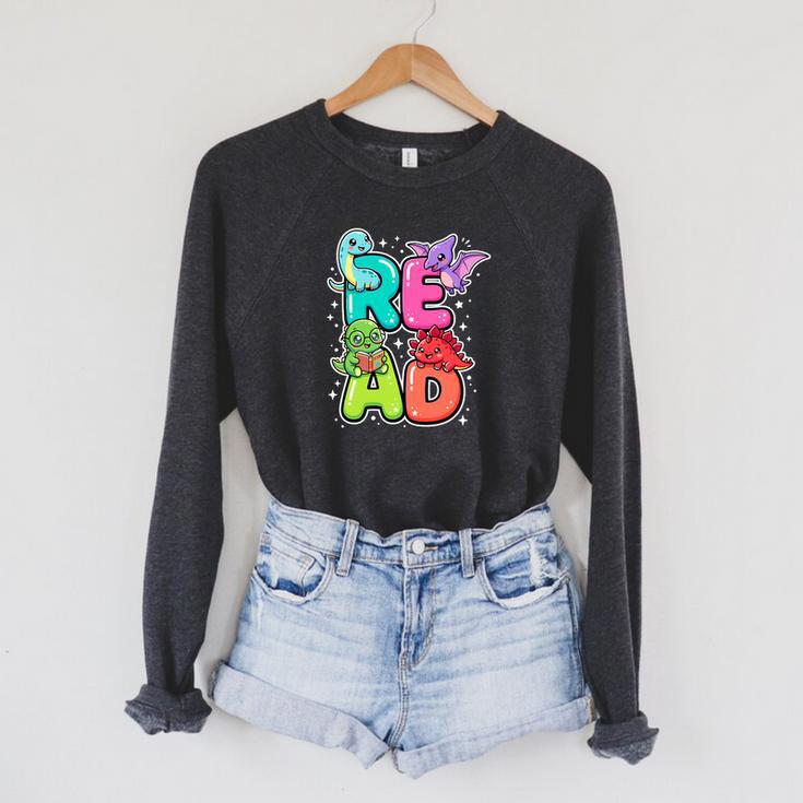 Dinosaur Read Book Lover Dino Reading Kids Premium Tri-Blend Raglan Sleeve Sweatshirt