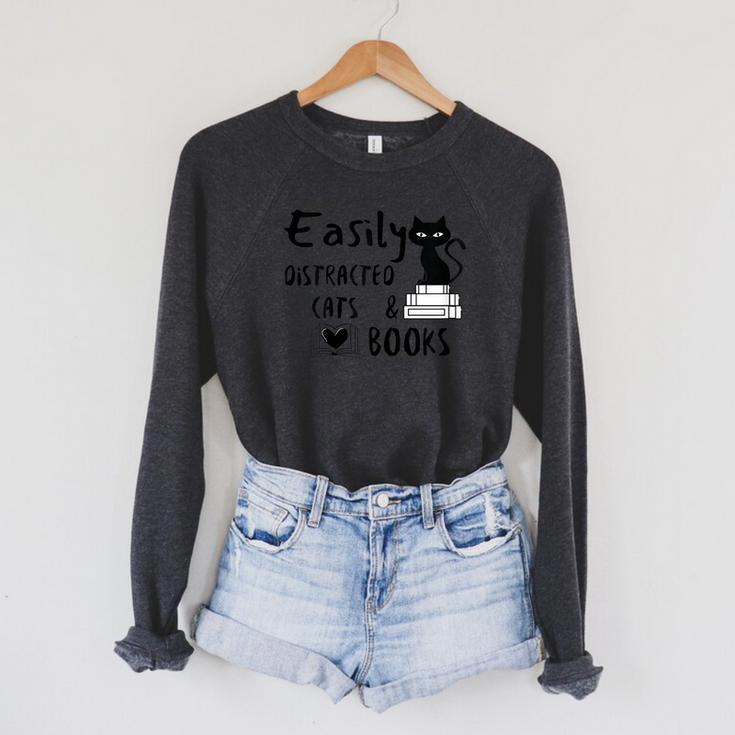 Easily Distracted Cats And Books Funny Book Lover Cat Gifts Women Raglan Sleeve Sweatshirt