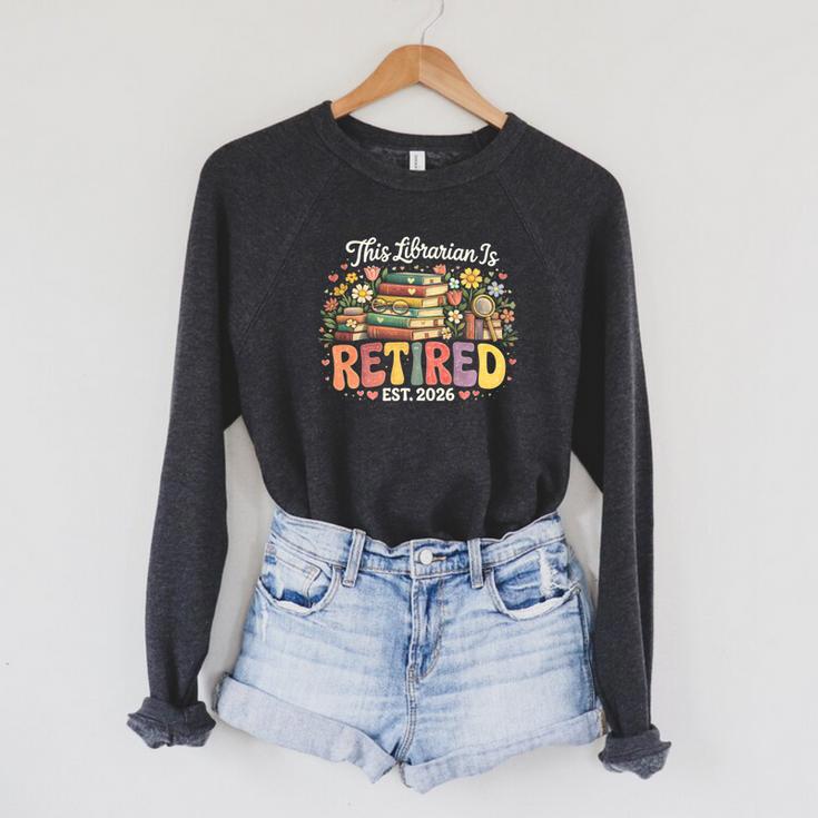 This Librarian Is Retired 2026 Book Lover Retirement Reading Premium Tri-Blend Raglan Sleeve Sweatshirt