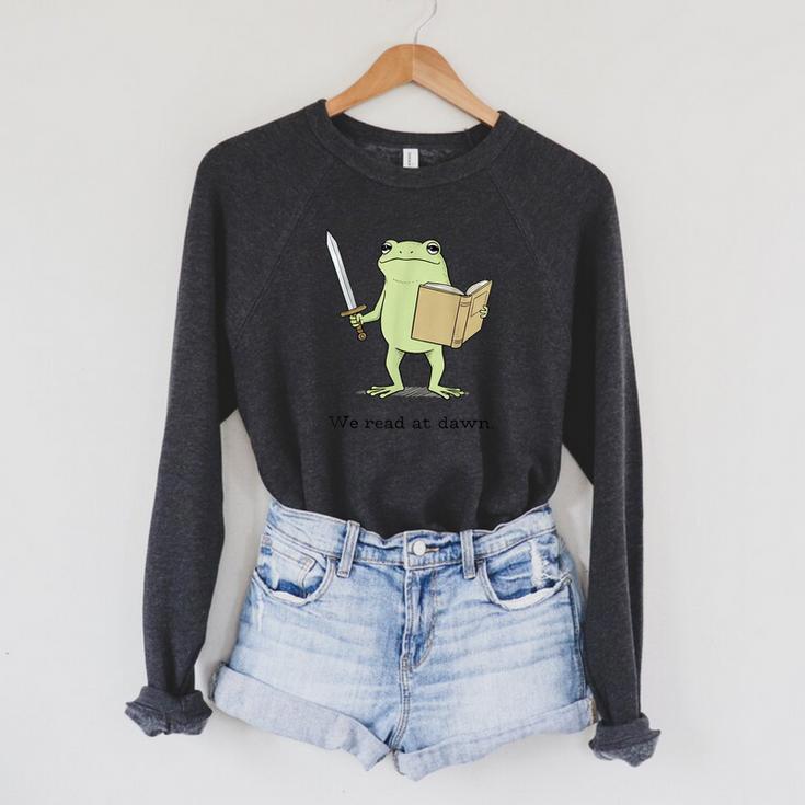 We Read At Dawn Bookish Frog Reading Raglan Sleeve Sweatshirt