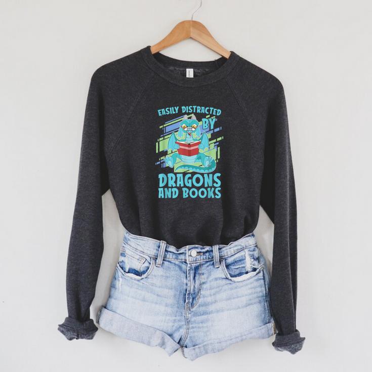 Reading Books Easily Distracted By Dragons And Books Raglan Sleeve Sweatshirt