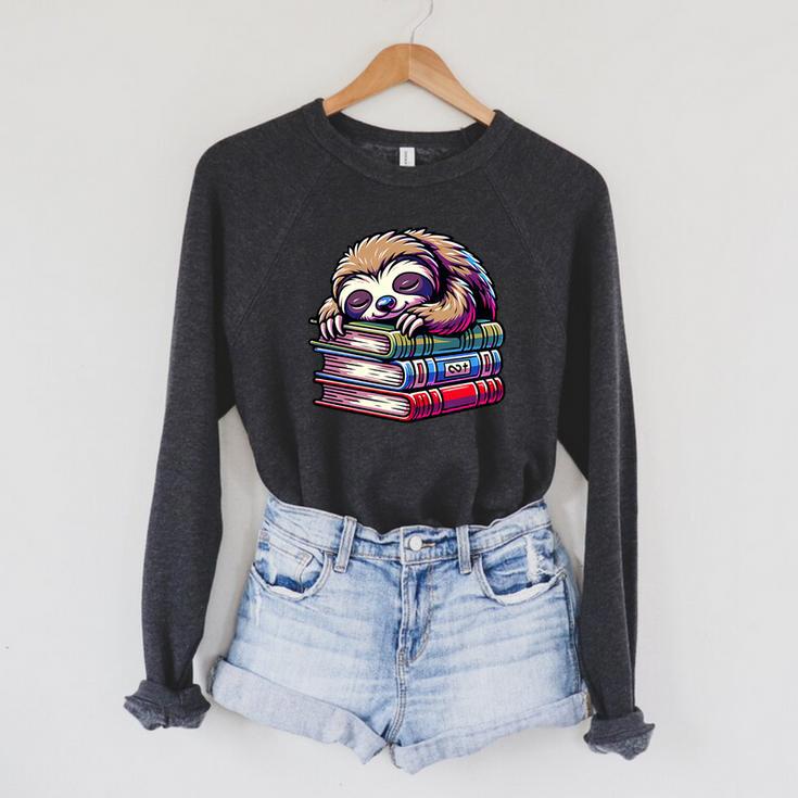 Reading Muffler Sloth On Stack Of Books Premium Tri-Blend Raglan Sleeve Sweatshirt