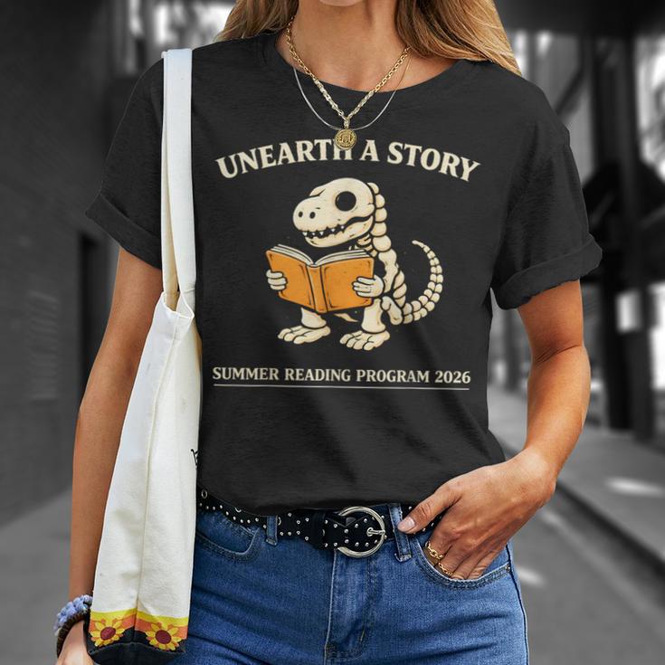 Dinosaur Books Readers Summer Reading 2026 Unearth a Story T-Shirt Gifts for Her Dinosaur Books Readers Summer Reading 2026 Unearth a Story T-Shirt Gifts for Her