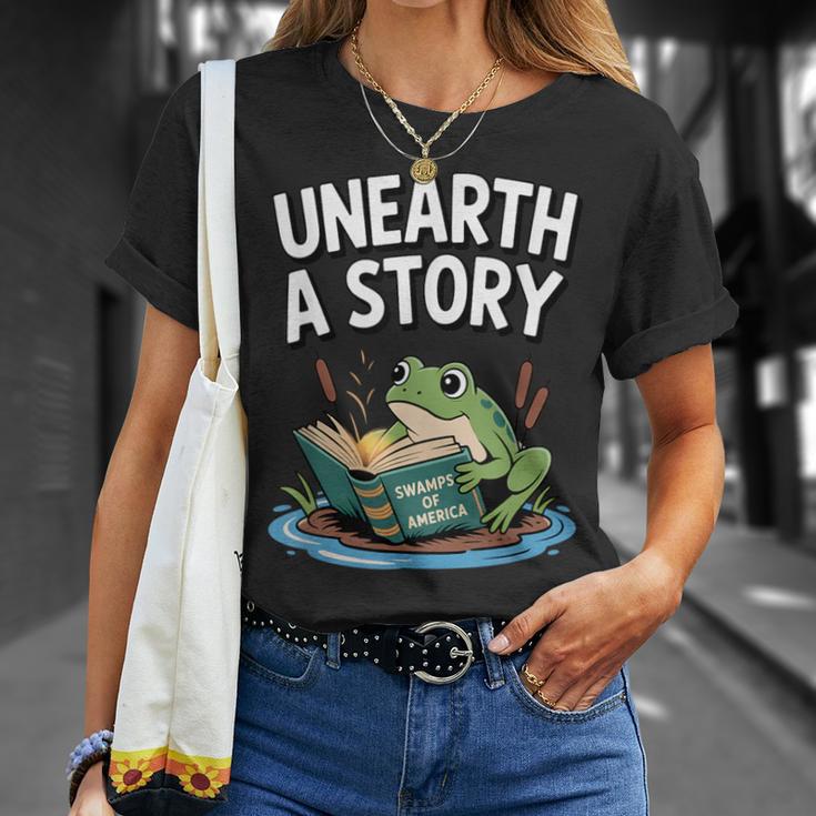 Unearth a Story Frog Reading a Book Summer 2026 T-Shirt Gifts for Her